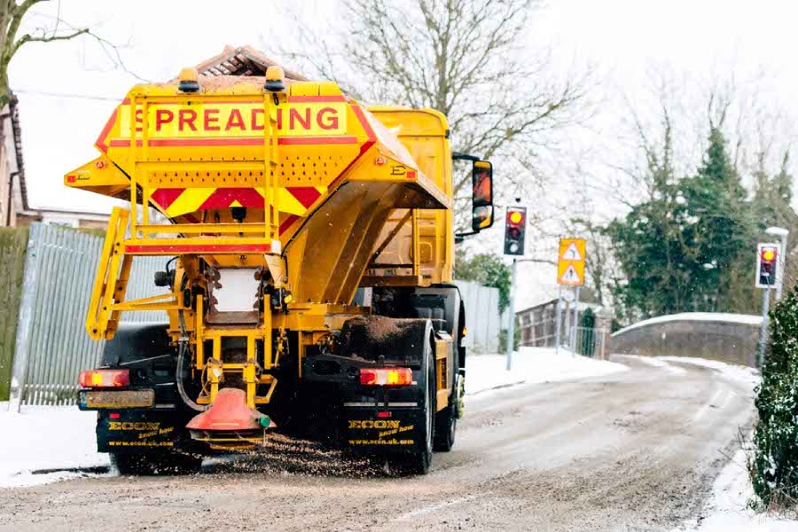 Road gritter in action showing some True Grit